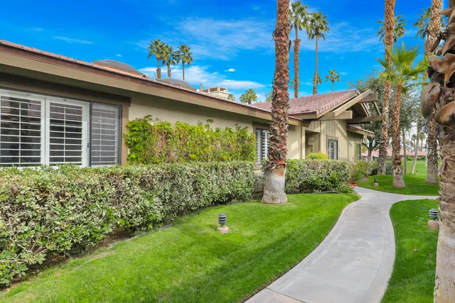 a view of a room with sliding door and wooden floor