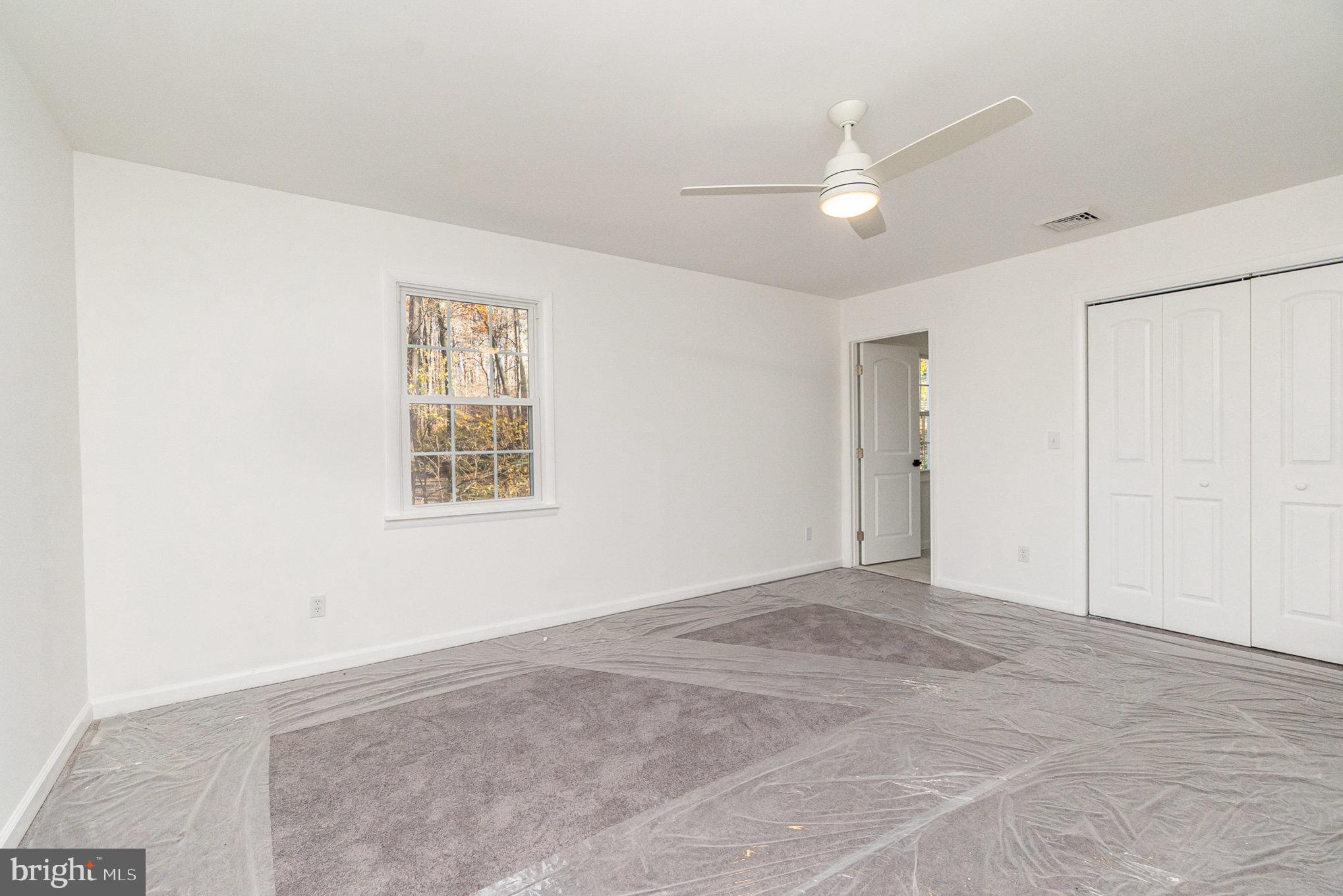 5505 Williams Road Hydes, MD 21082 - Photo 20 of 42 a view of an empty room with a window