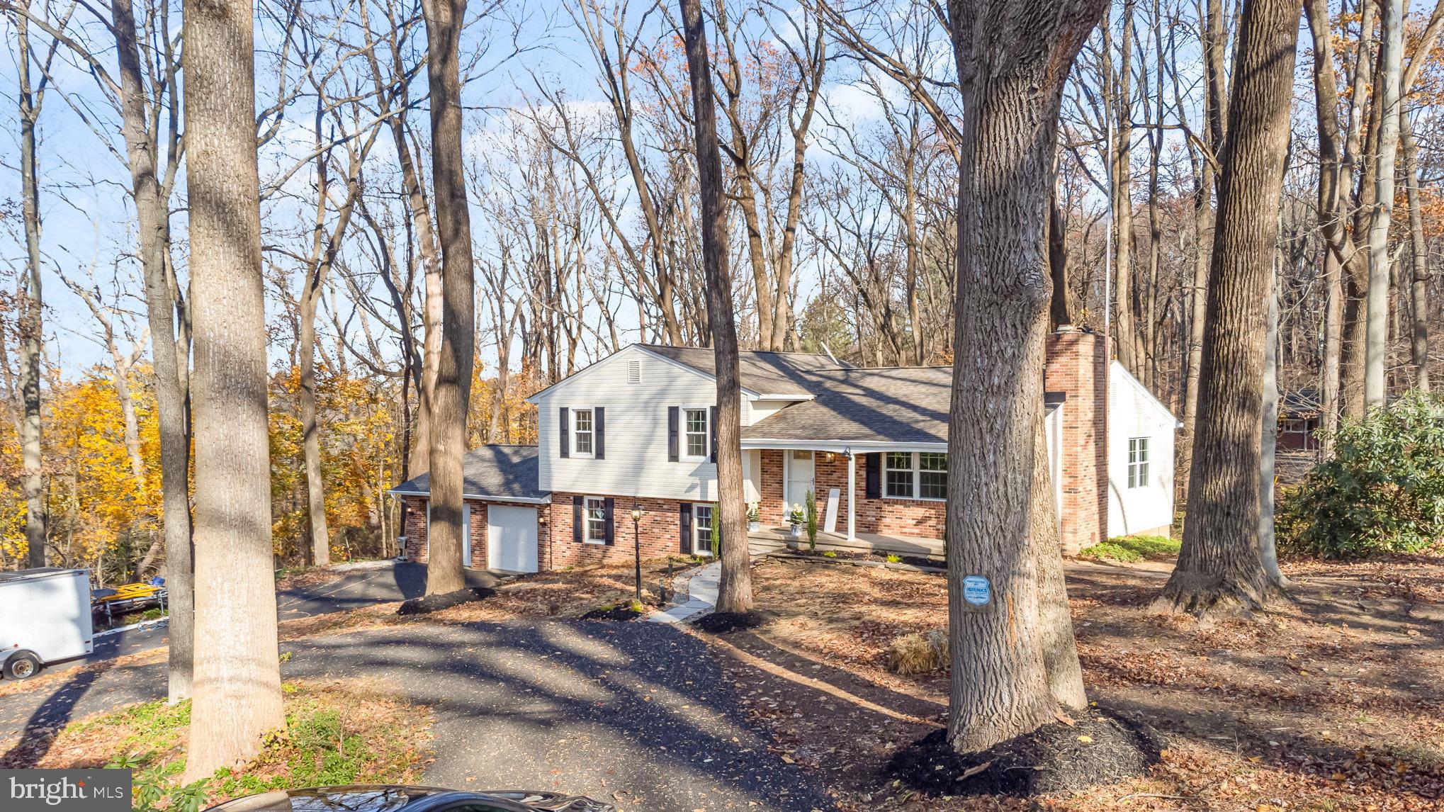 5505 Williams Road Hydes, MD 21082 - Photo 2 of 42 a view of a town with brick house and large trees