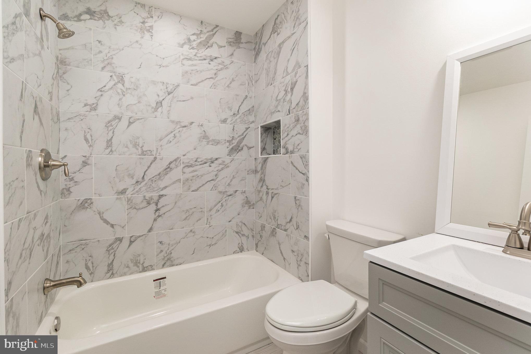 5505 Williams Road Hydes, MD 21082 - Photo 22 of 42 a bathroom with a toilet and a sink
