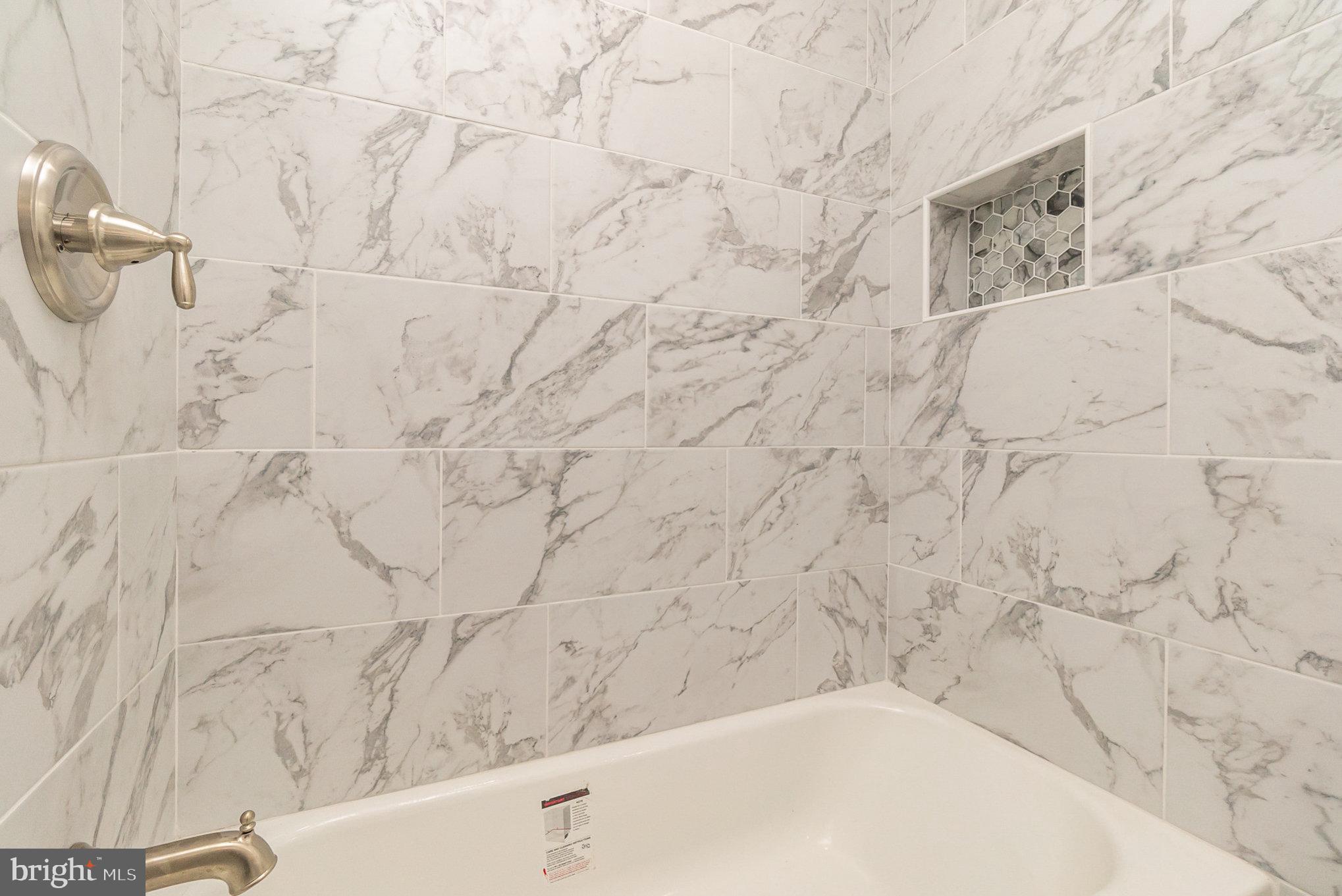 5505 Williams Road Hydes, MD 21082 - Photo 23 of 42 a bathroom with a bathtub