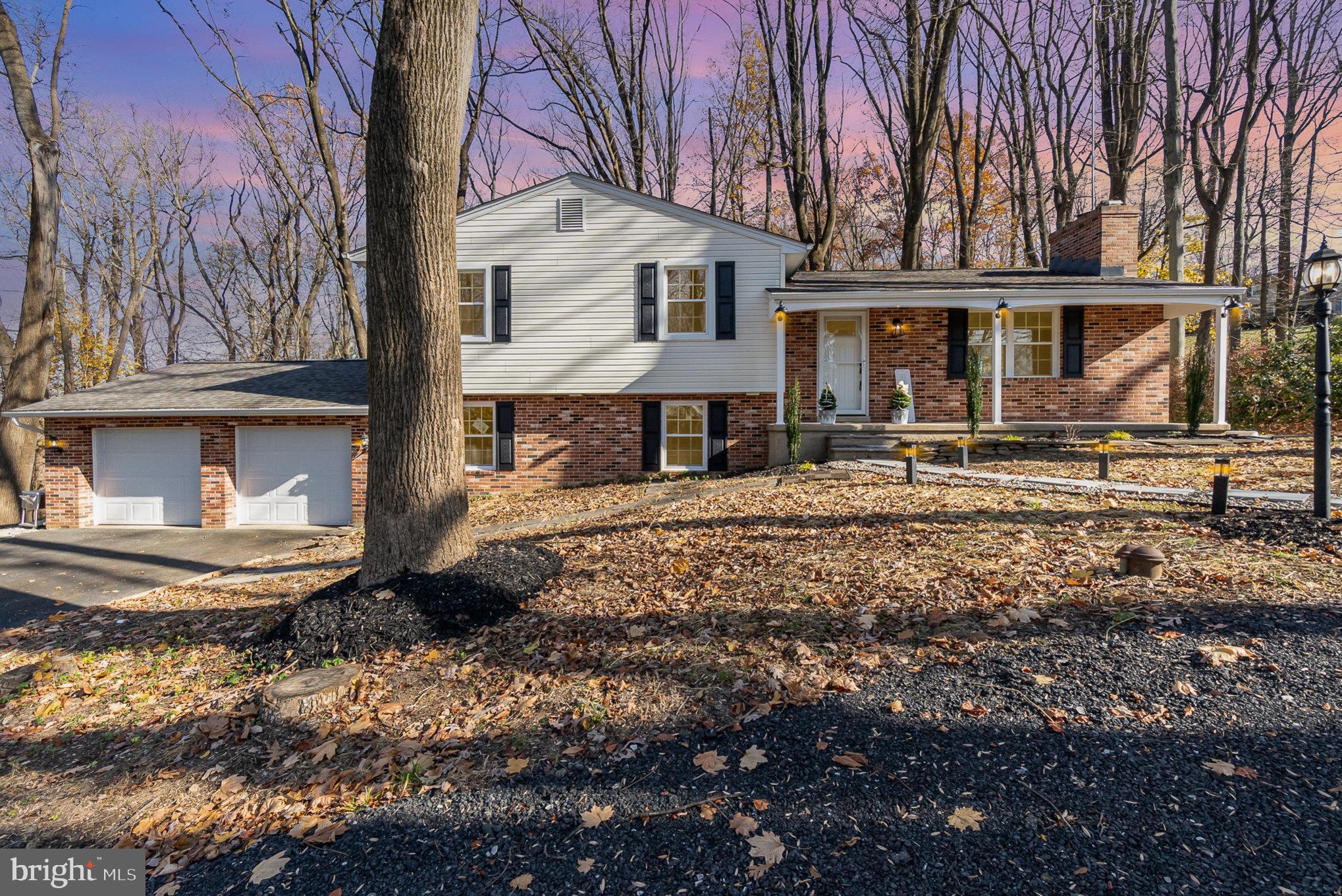 5505 Williams Road Hydes, MD 21082 - Photo 3 of 42 a front view of a house with garden