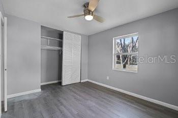 1533 North Normandy Boulevard Deltona, FL 32725 - Photo 14 of 15 an empty room with windows and closet