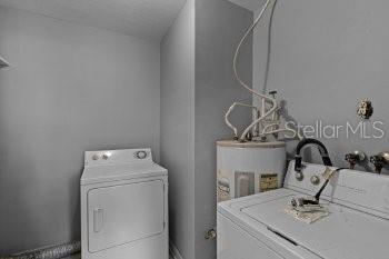 1533 North Normandy Boulevard Deltona, FL 32725 - Photo 15 of 15 a bathroom with a sink and a mirror