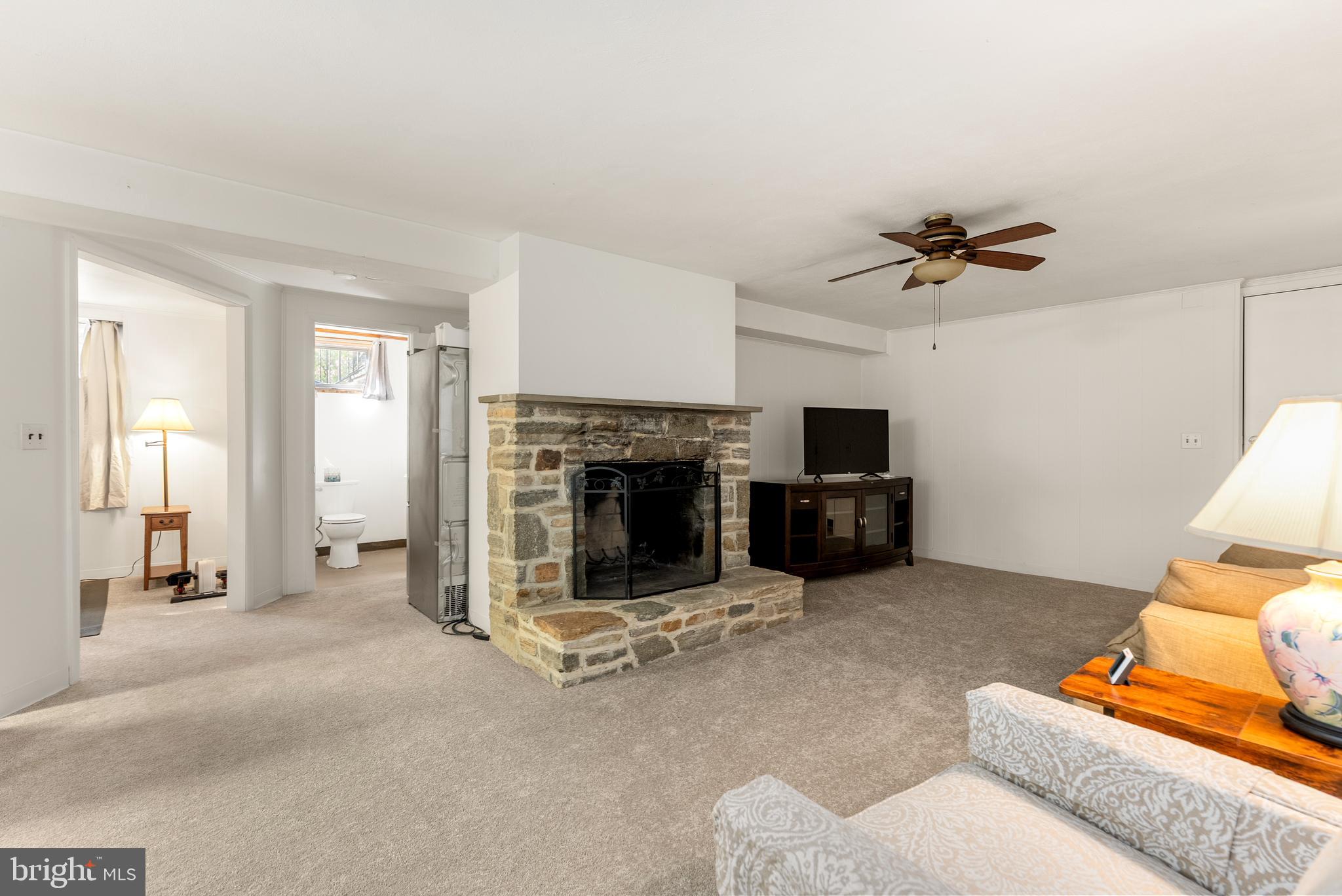 1201 Providence Road Towson, MD 21286 - Photo 23 of 35 a living room with furniture and a fireplace