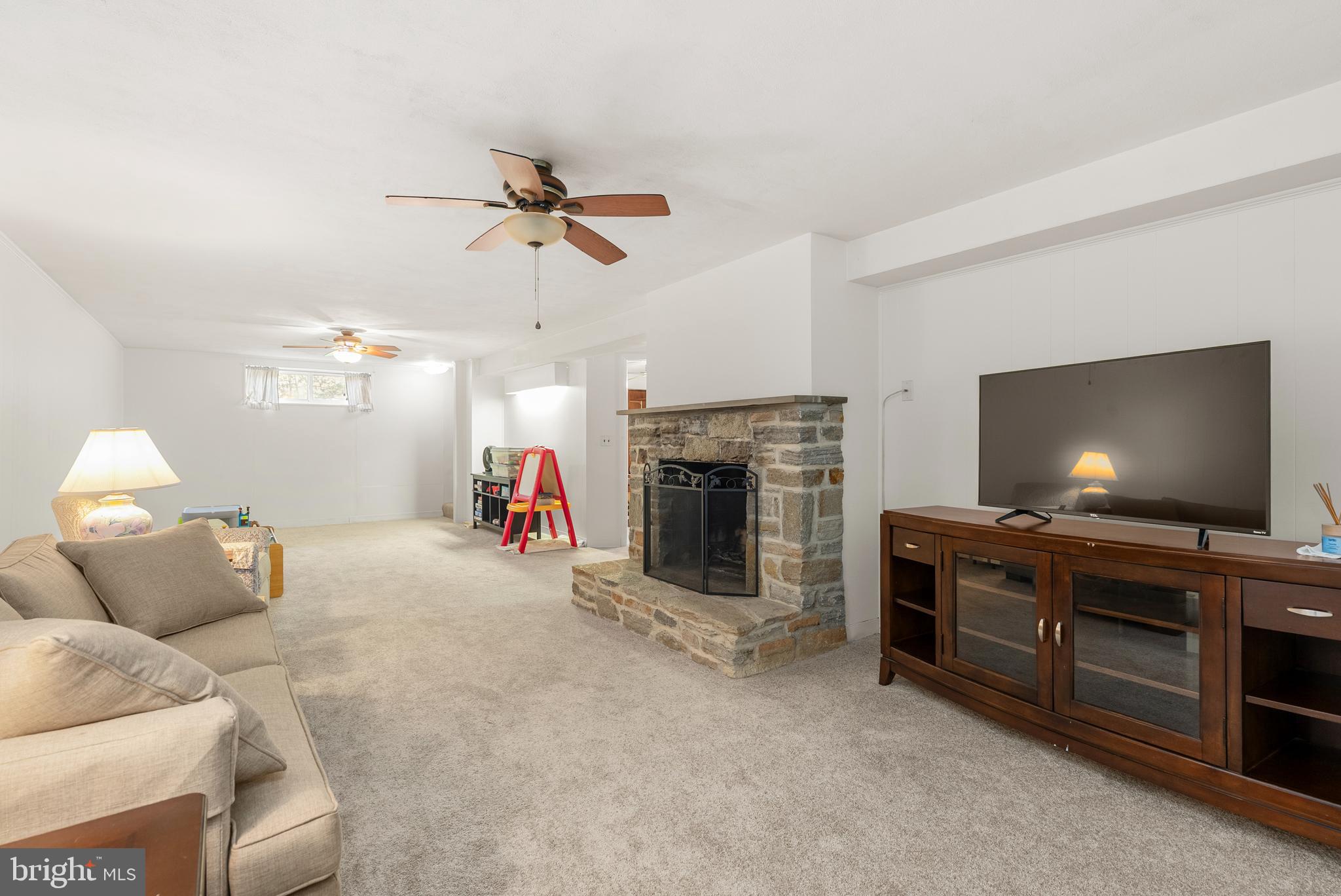 1201 Providence Road Towson, MD 21286 - Photo 24 of 35 a living room with furniture and a flat screen tv