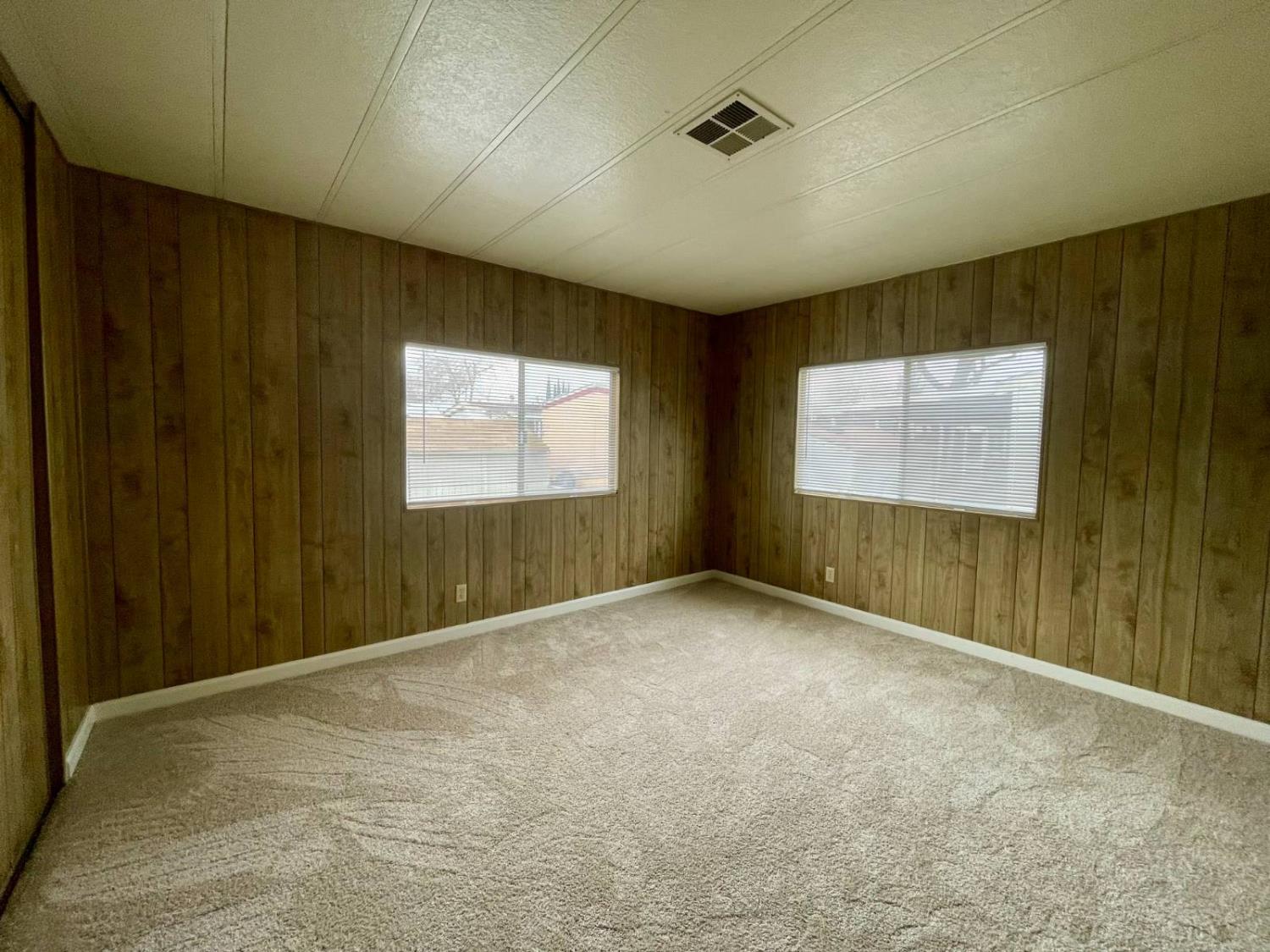 3901 Lake Road, Unit 111 West Sacramento, CA 95691 - Photo 15 of 16 an empty room with windows