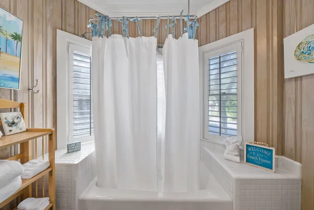 a living room with a couch and a table