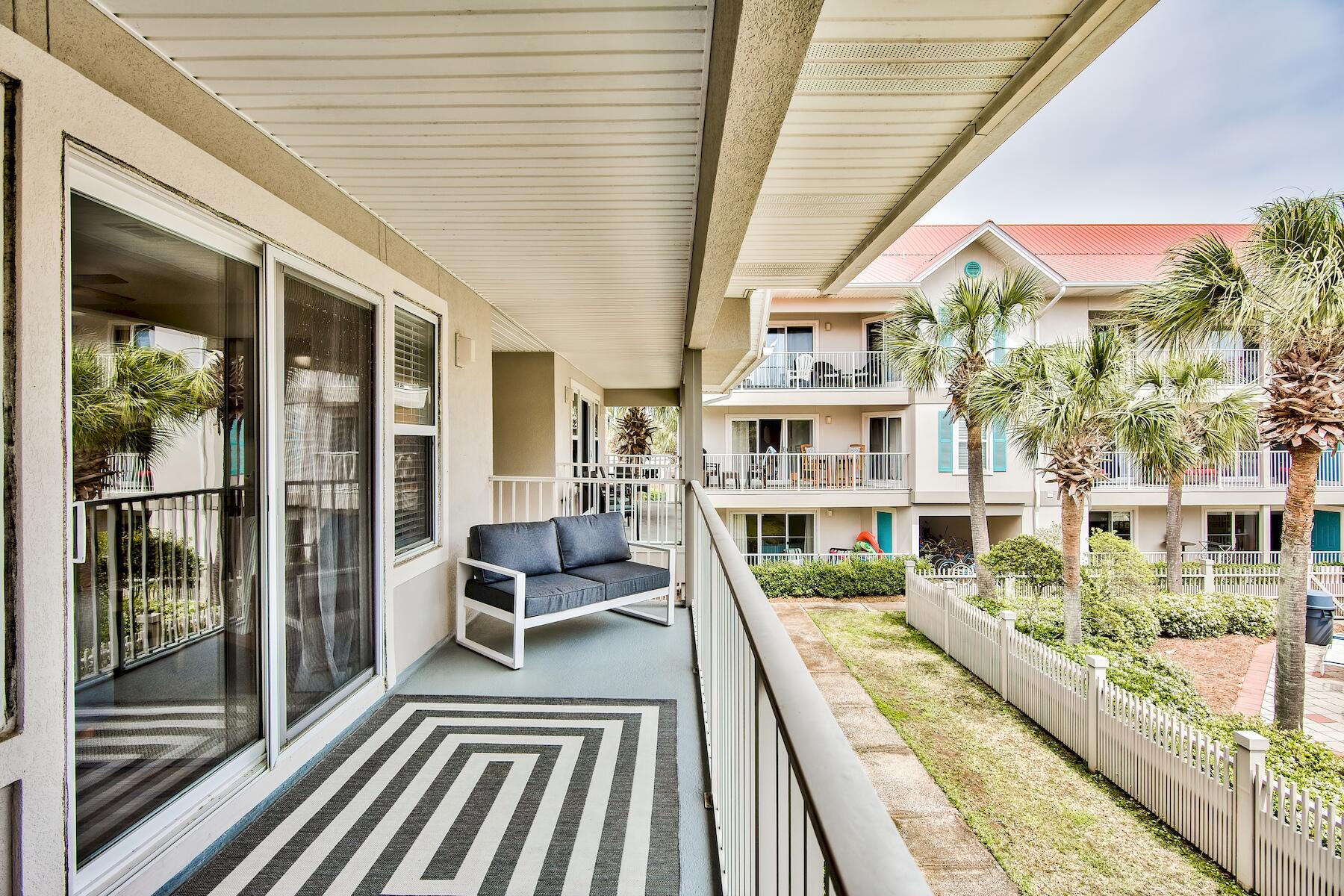 82 Sugar Sand Lane, Unit A7 Santa Rosa Beach, FL 32459 - Photo 16 of 35 a view of balcony with seating space