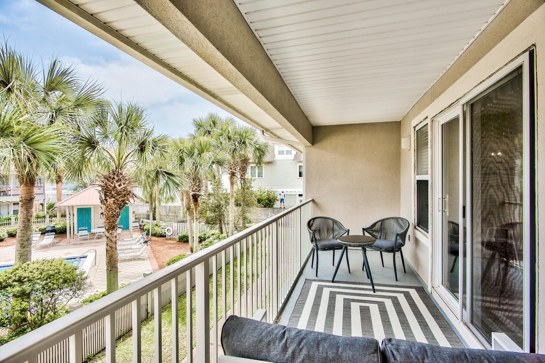 82 Sugar Sand Lane, Unit A7 Santa Rosa Beach, FL 32459 - Photo 21 of 35 a view of balcony with furniture