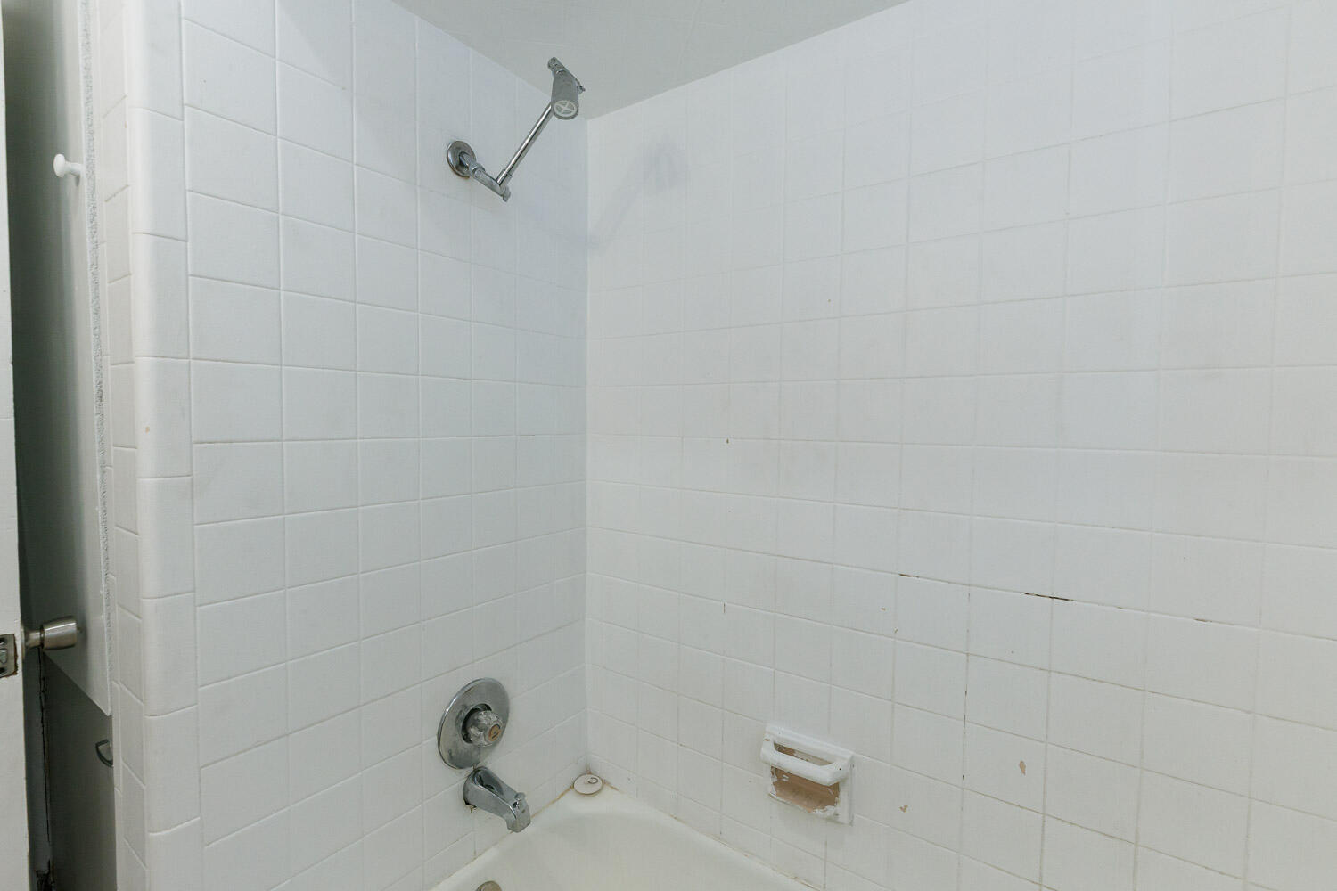 2417 37th Street Lubbock, TX 79412 - Photo 27 of 35 a bathroom with a bathtub
