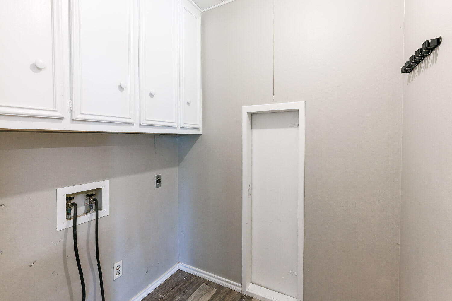 2417 37th Street Lubbock, TX 79412 - Photo 30 of 35 a view of door with cabinets