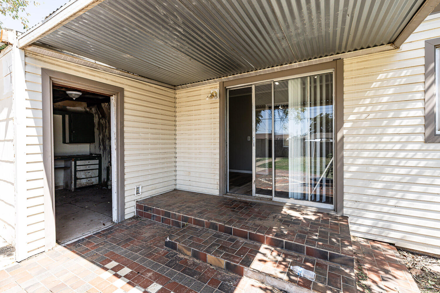 2417 37th Street Lubbock, TX 79412 - Photo 32 of 35 a view of a house with a door and wooden floor