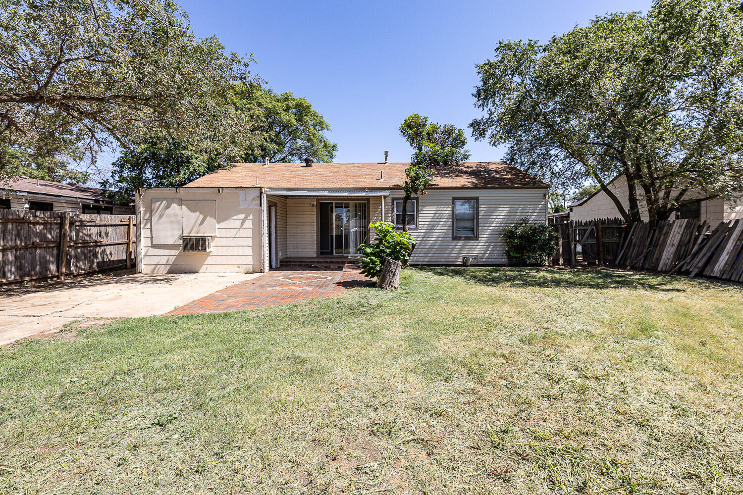 2417 37th Street Lubbock, TX 79412 - Photo 33 of 35 a view of a house with a yard