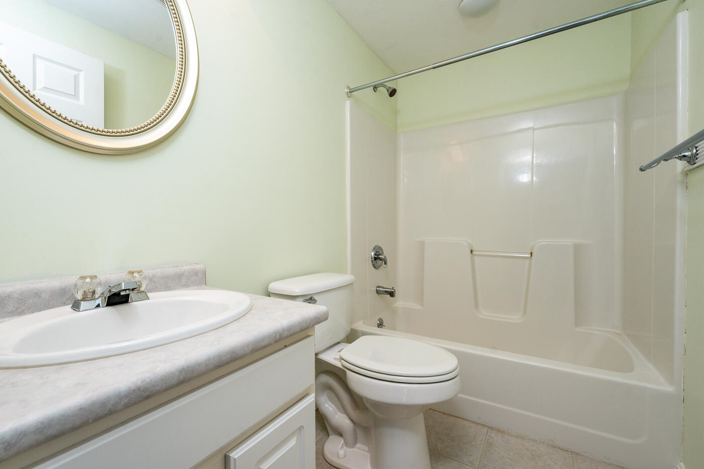 15 Beacon Court Mashpee, MA 02649 - Photo 14 of 33 a bathroom with a sink a toilet and a mirror