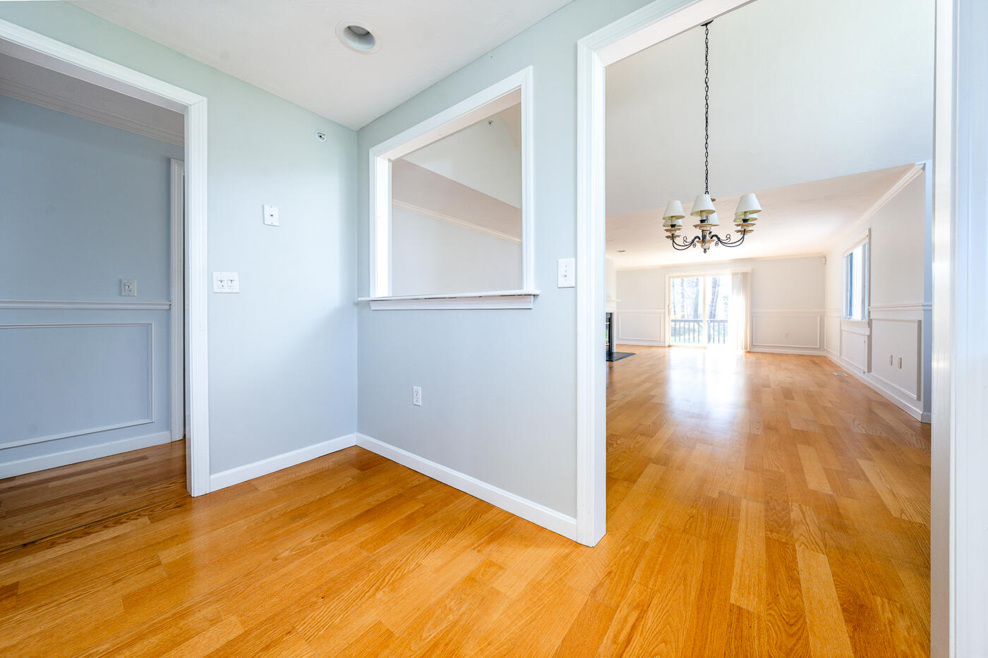 15 Beacon Court Mashpee, MA 02649 - Photo 6 of 33 a view of empty room with wooden floor