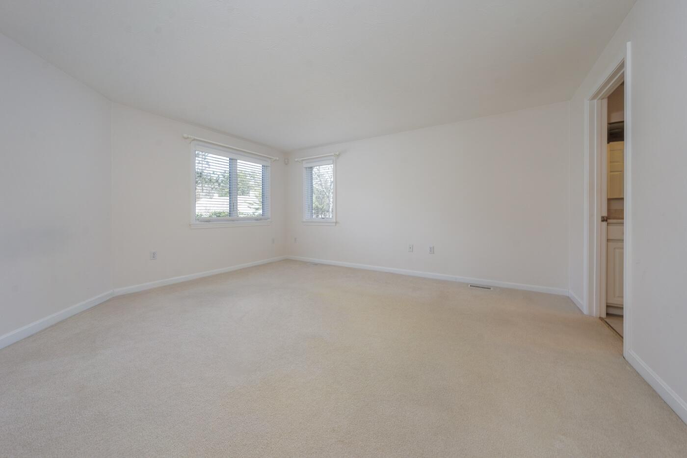 15 Beacon Court Mashpee, MA 02649 - Photo 10 of 33 an empty room with windows