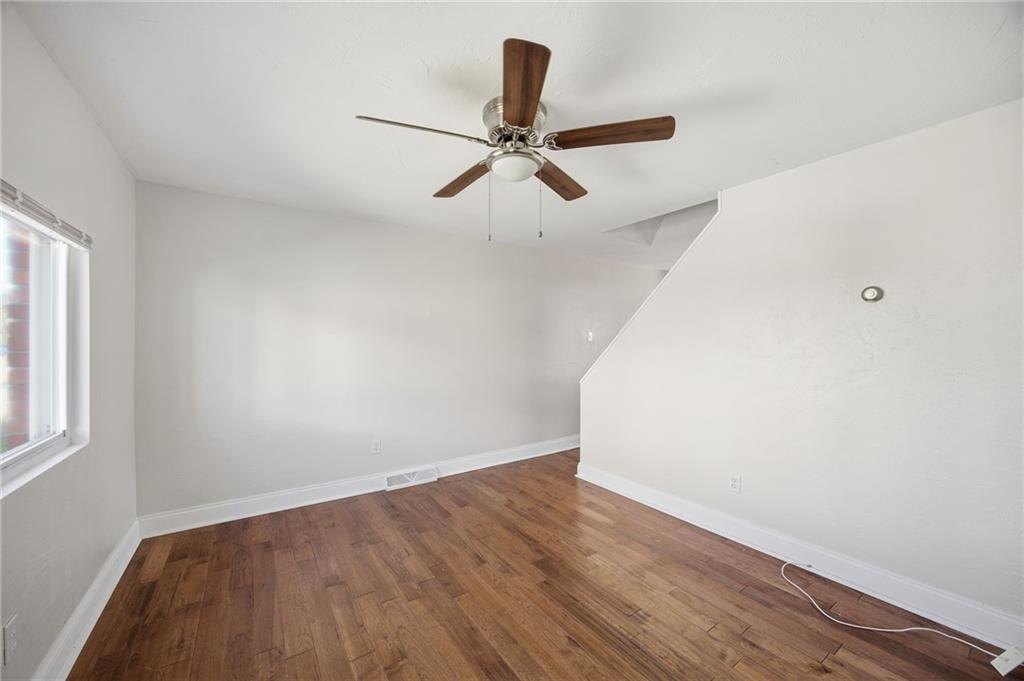 5 Rosamond Street McKees Rocks, PA 15136 - Photo 4 of 17 wooden floor in an empty room