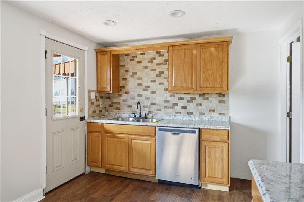 5 Rosamond Street McKees Rocks, PA 15136 - Photo 7 of 17 a bathroom with a sink and a mirror