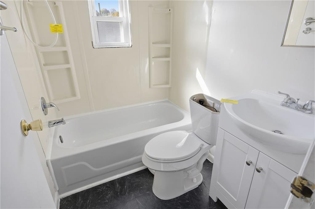 5 Rosamond Street McKees Rocks, PA 15136 - Photo 8 of 17 a bathroom with a sink and a toilet
