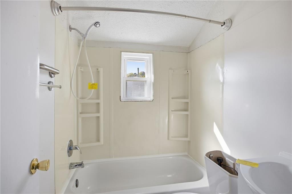 5 Rosamond Street McKees Rocks, PA 15136 - Photo 10 of 17 a bathroom with a shower