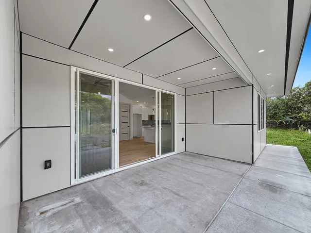 a view of an empty room with a sink