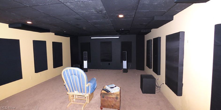 9409 Harrison Road Wakeman, OH 44889 - Photo 16 of 19 View of Basement Home Theater Room with Projector and Screen