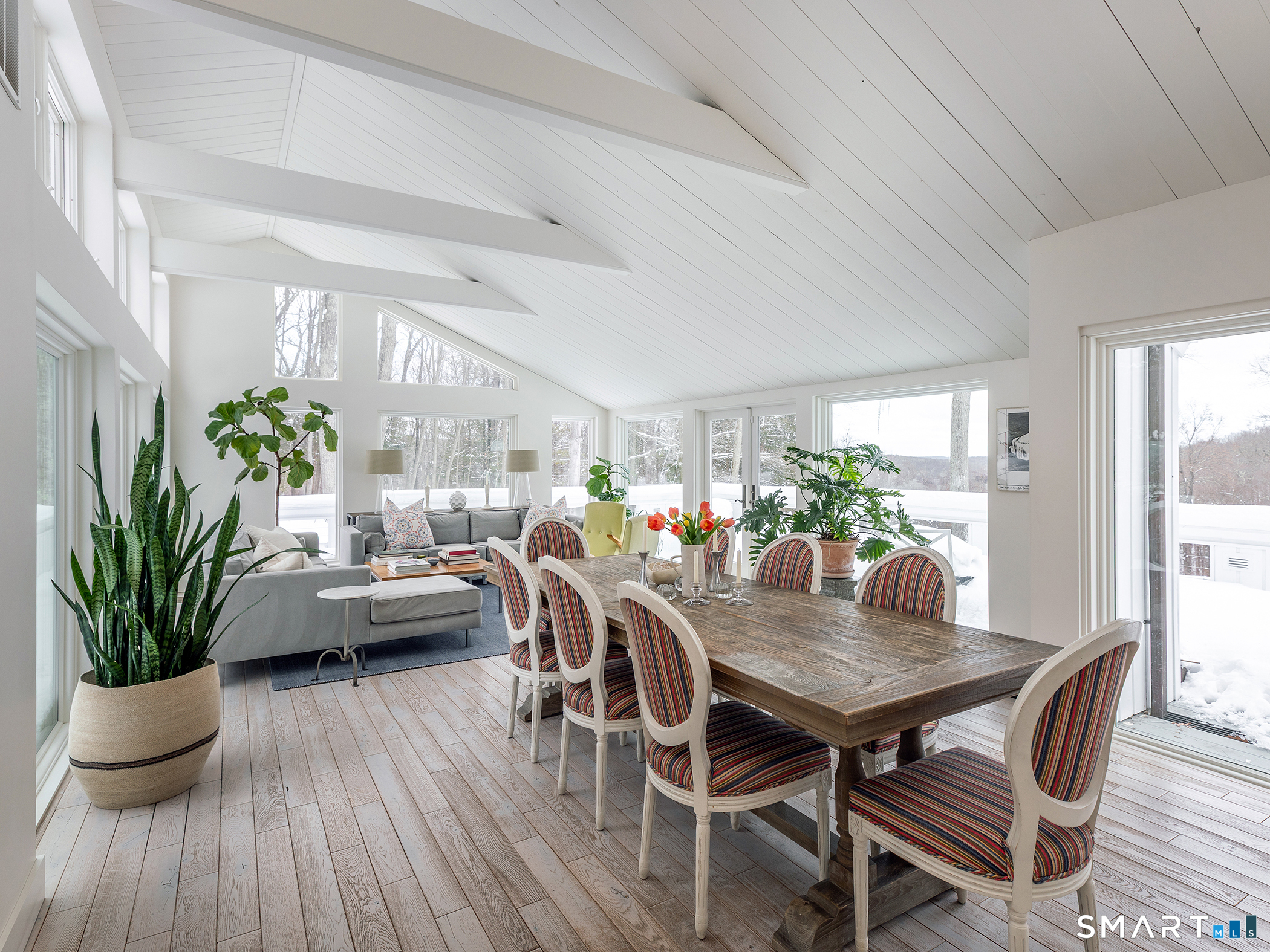 63 West Mountain Road Washington, CT 06793 - Photo 12 of 31 a view of a dining room with furniture window and wooden floor