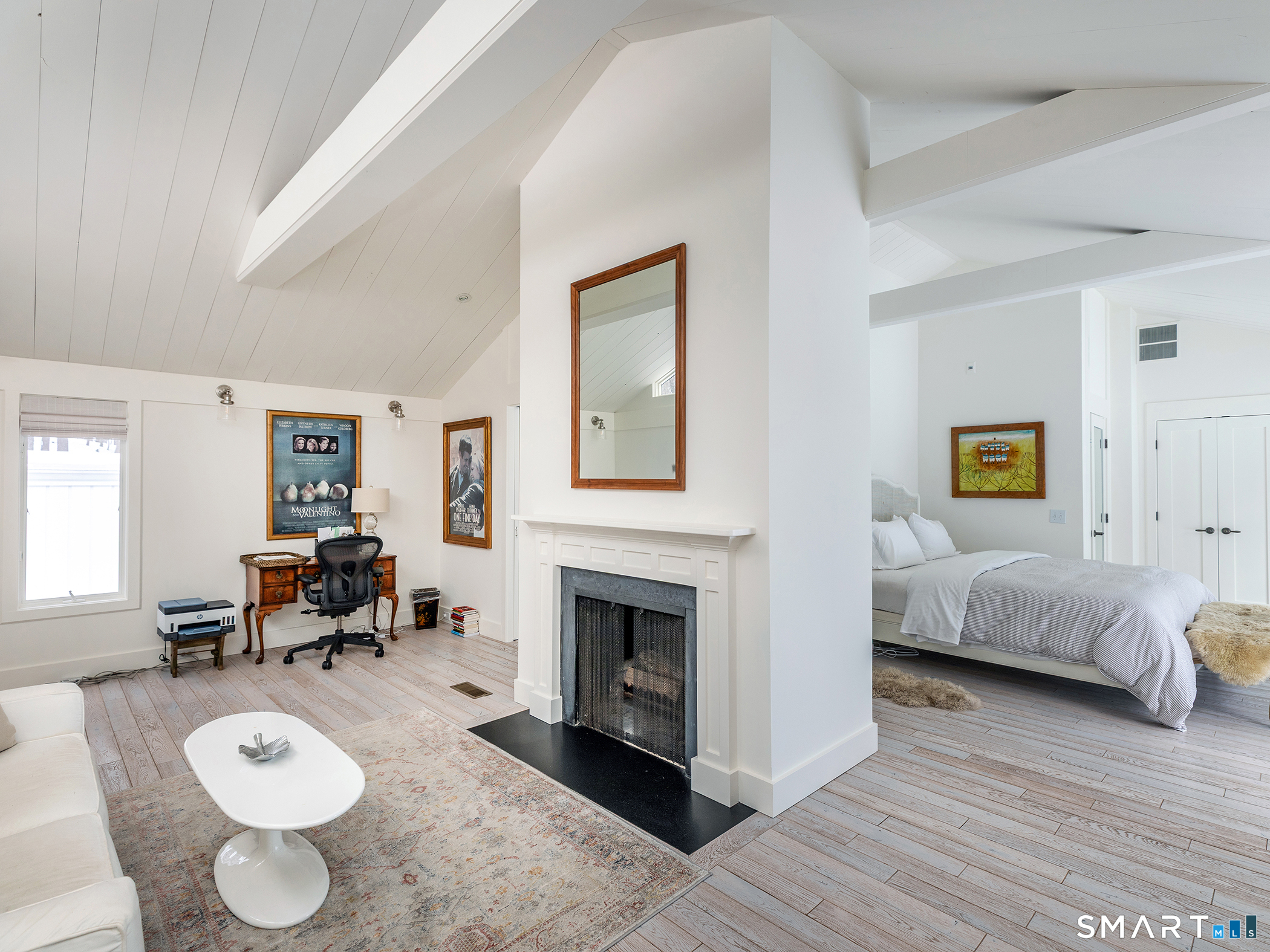 63 West Mountain Road Washington, CT 06793 - Photo 26 of 31 a living room with furniture and a fireplace
