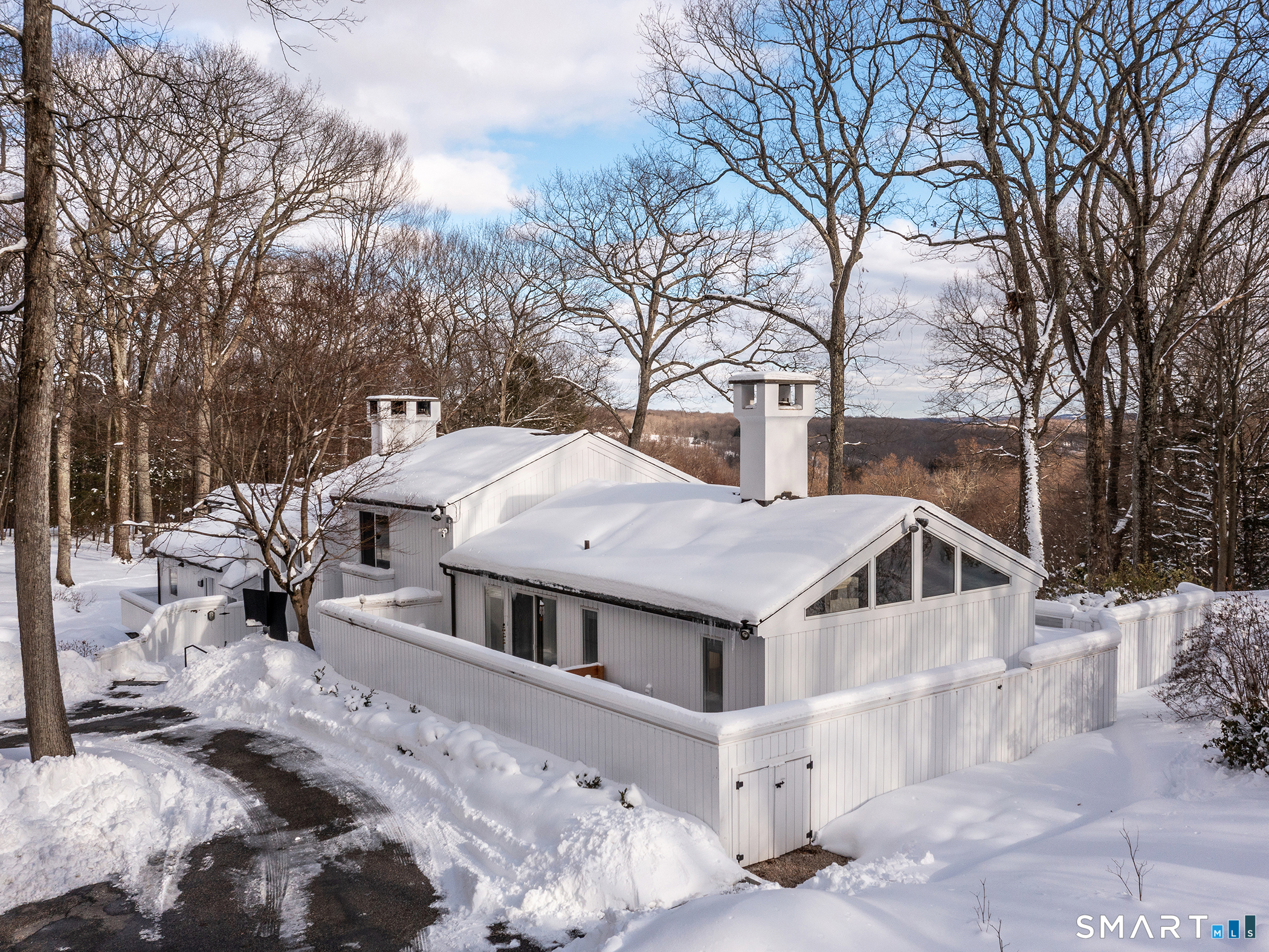 63 West Mountain Road Washington, CT 06793 - Photo 3 of 31 a house with trees in front of it