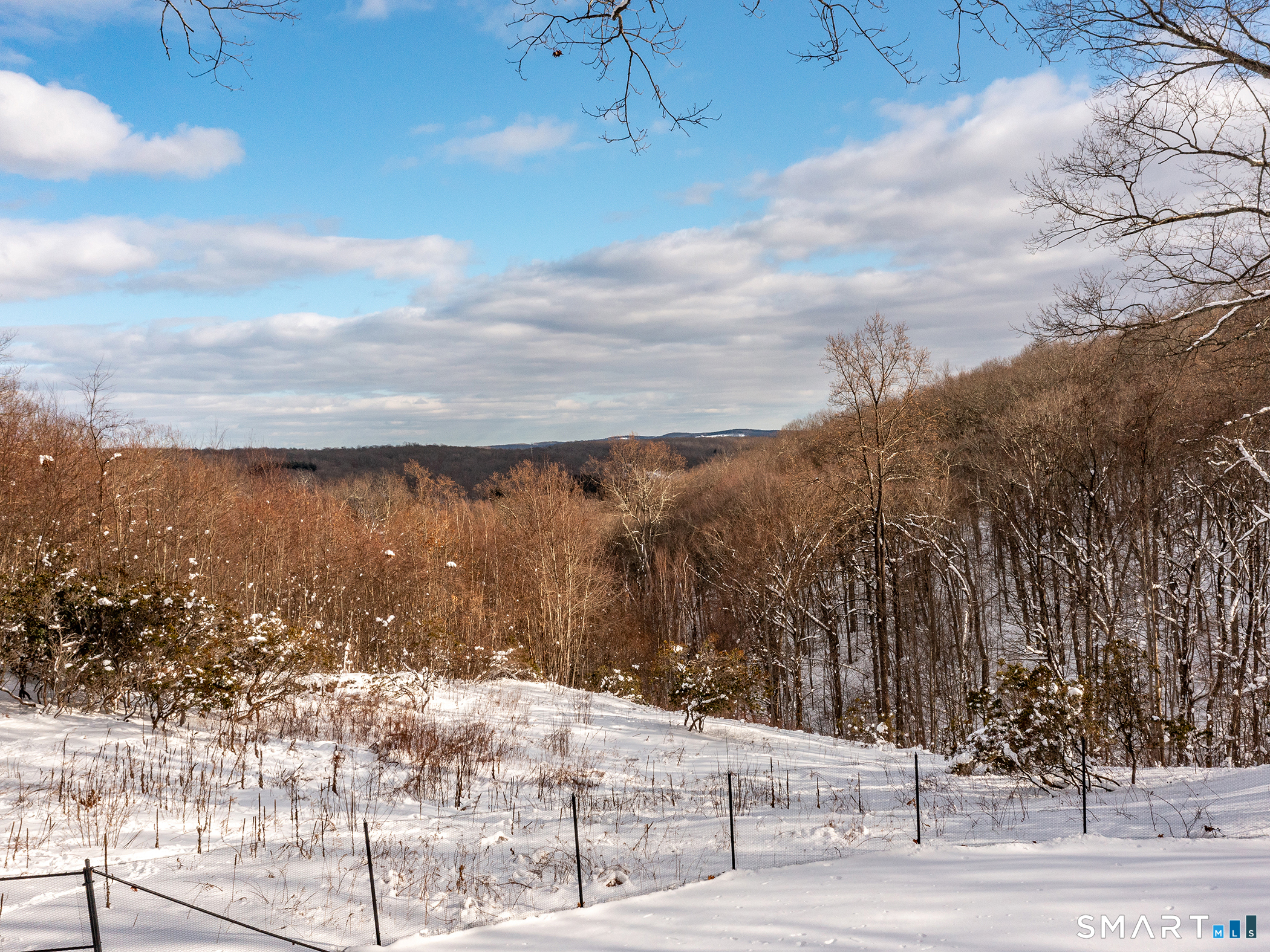 63 West Mountain Road Washington, CT 06793 - Photo 4 of 31 a view of a yard with wooden fence
