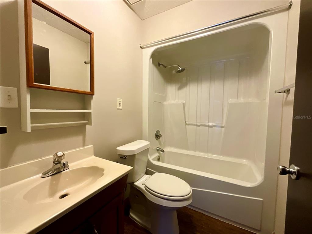 600 Wakulla Street Florahome, FL 32140 - Photo 23 of 47 a bathroom with a sink a toilet and shower