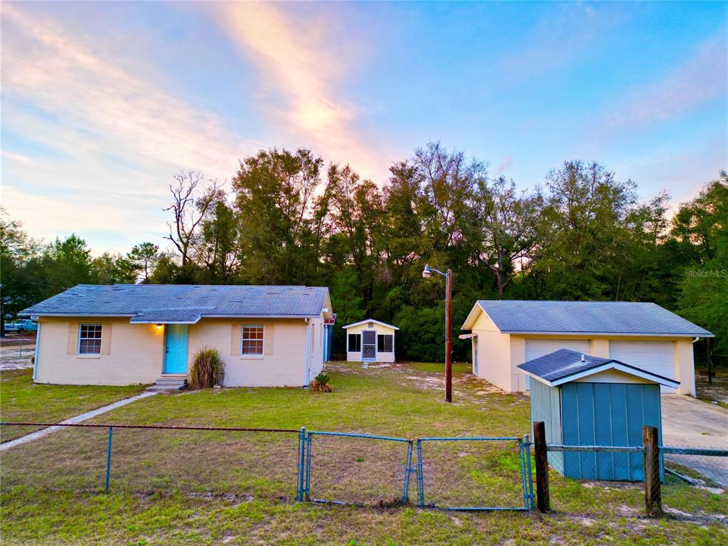 600 Wakulla Street Florahome, FL 32140 - Photo 26 of 47 a front view of house with yard and entertaining space