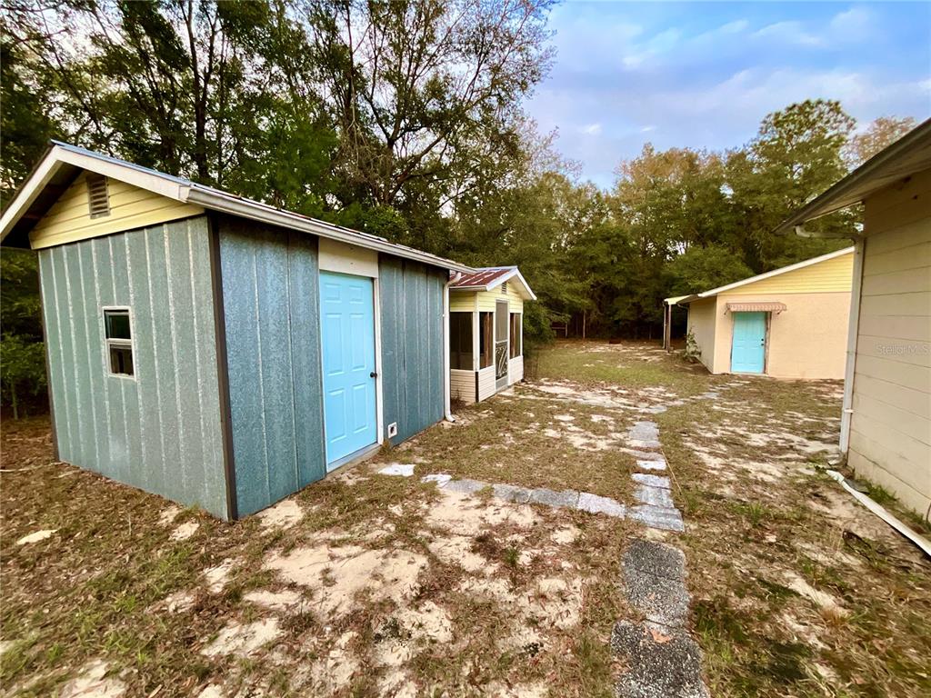 600 Wakulla Street Florahome, FL 32140 - Photo 27 of 47 a view of a house with a backyard