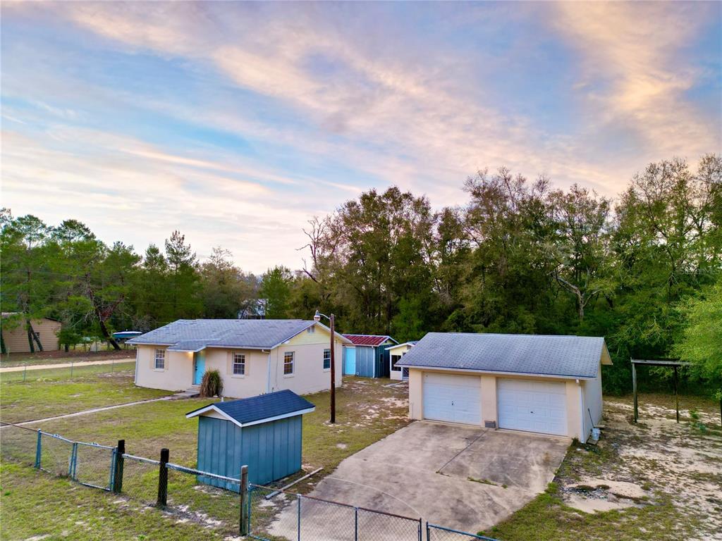600 Wakulla Street Florahome, FL 32140 - Photo 29 of 47 a front view of a house with garden