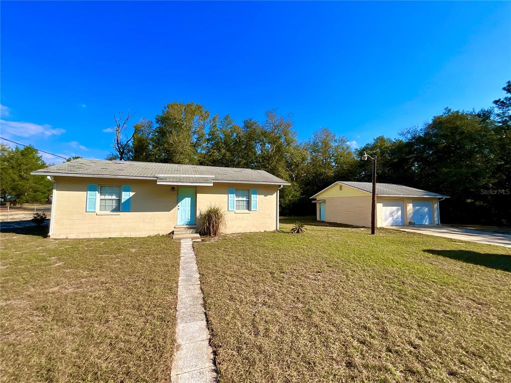 600 Wakulla Street Florahome, FL 32140 - Photo 6 of 47 a house with trees in the background