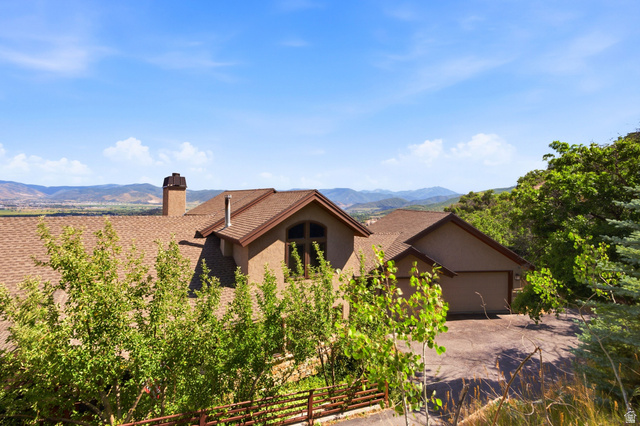 335 Bern Way Midway, UT 84049 - Photo 83 of 88 Exterior with a multi-gabled roofline and a stucco facade