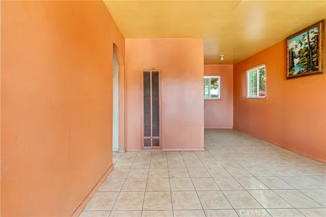 a view of a hallway with a white walls