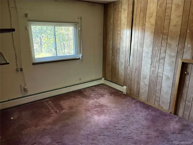 a white refrigerator freezer sitting in a kitchen