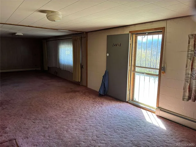 a view of a lake with car parked