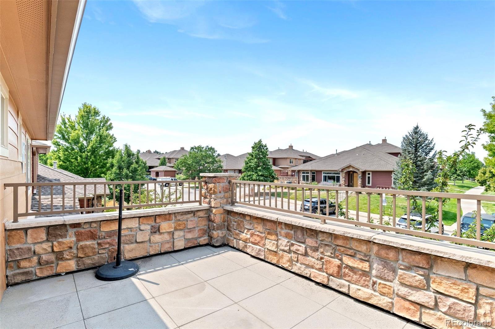 8540 Gold Peak Lane, Unit C Highlands Ranch, CO 80130 - Photo 29 of 37 a view of a houses with a terrace