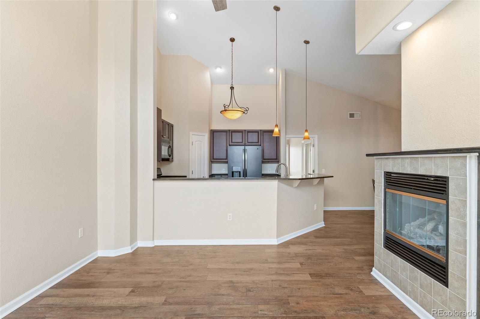 8540 Gold Peak Lane, Unit C Highlands Ranch, CO 80130 - Photo 10 of 37 a view of a kitchen and an entryway