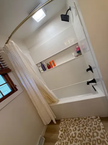 a bathroom with a bathtub