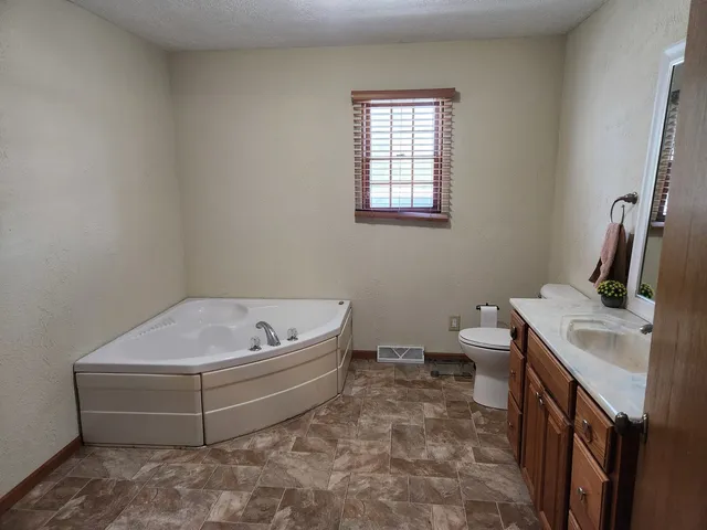 a bathroom with a sink and a toilet