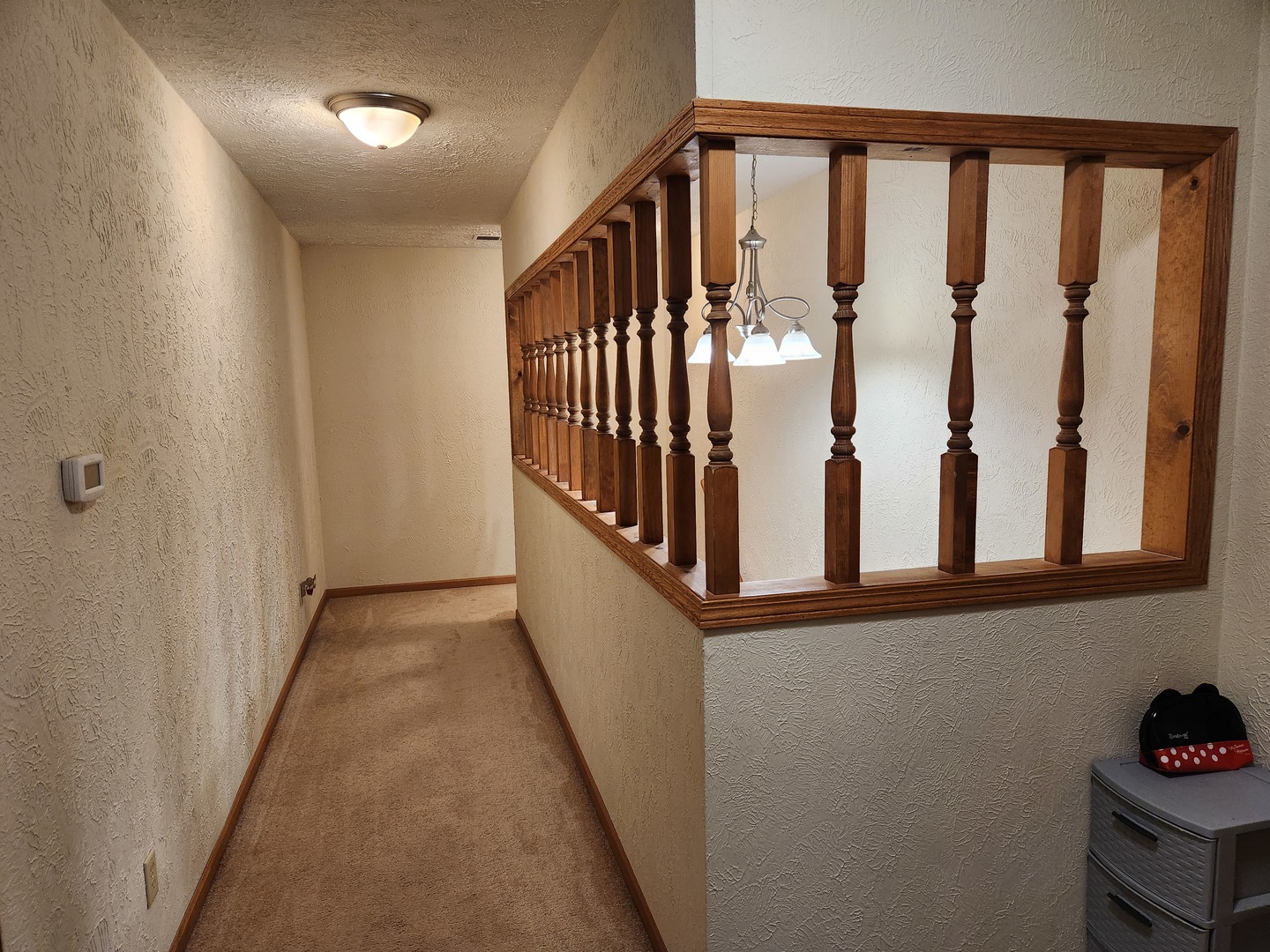 1275 Winn Road Sterling, IL 61081 - Photo 21 of 29 a view of a hallway with wooden floor and entryway