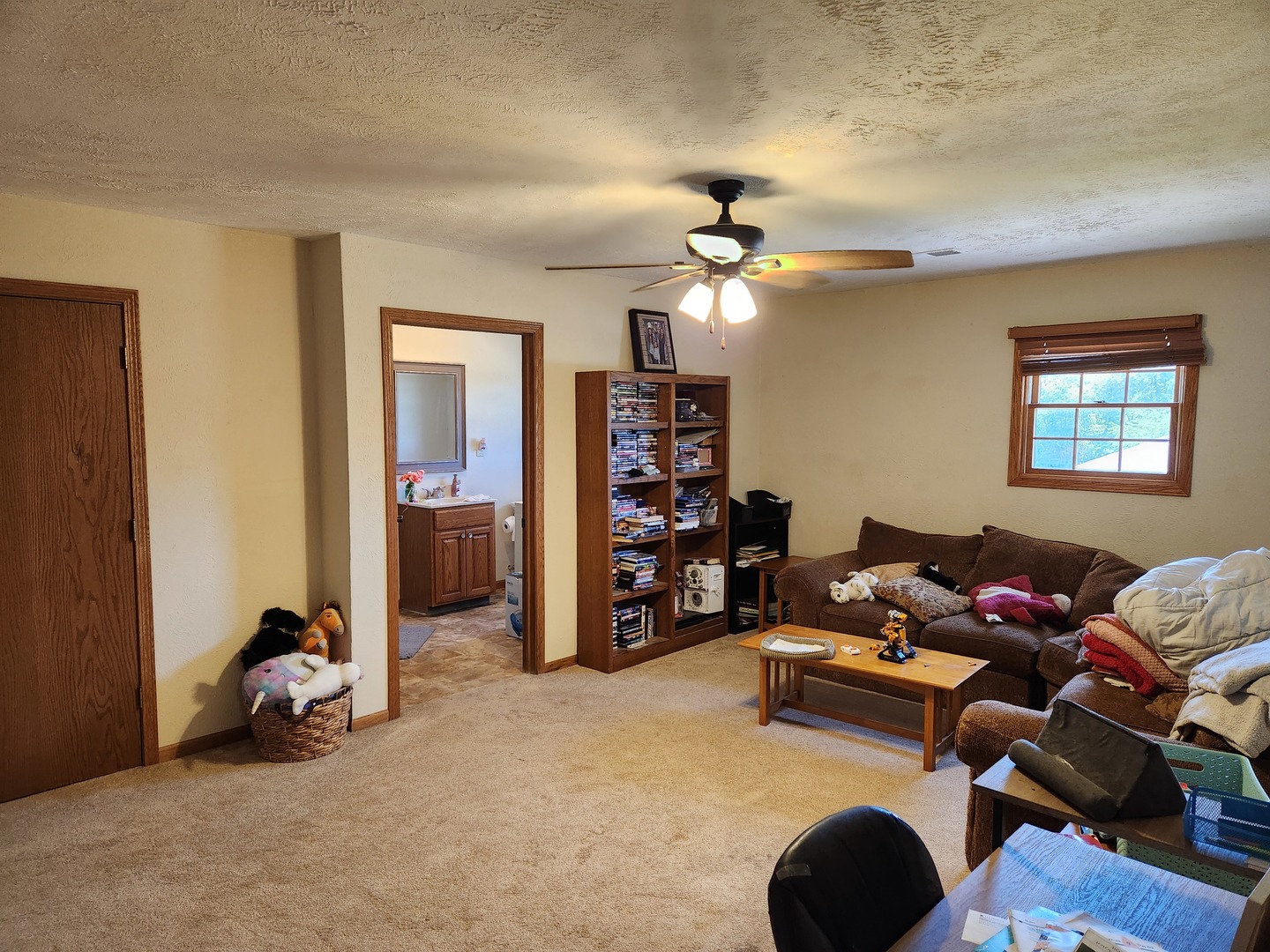 1275 Winn Road Sterling, IL 61081 - Photo 23 of 29 a living room with furniture and a flat screen tv