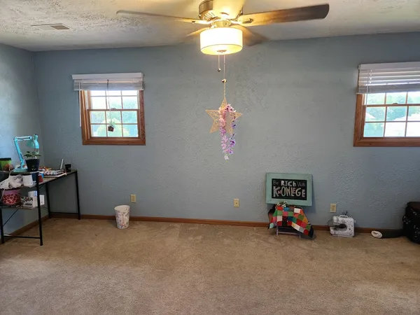 a view of livingroom with furniture