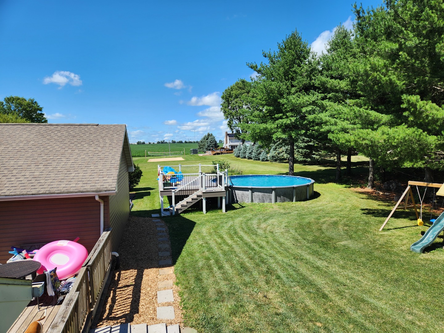 1275 Winn Road Sterling, IL 61081 - Photo 5 of 29 a view of a house with backyard porch and sitting area