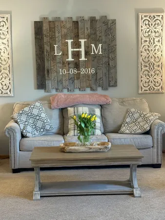 a living room with furniture and a rug