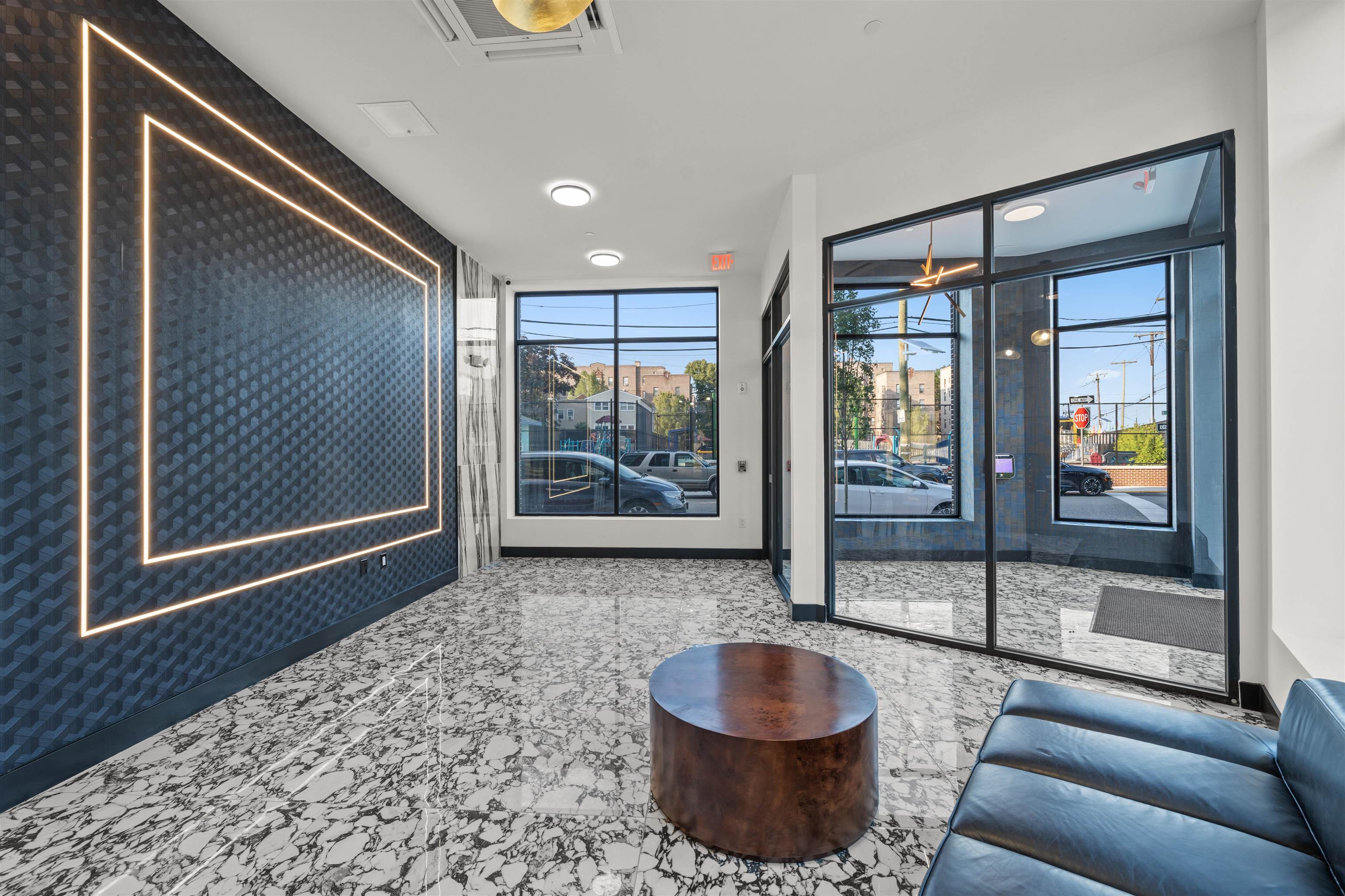 17 Ave East, Unit 504 Bayonne, NJ 07002 - Photo 16 of 30 a living room with furniture and a gate